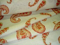 Folded fabric image Duralee Cumbria Paisley Coral at store.schindlersfabrics.com