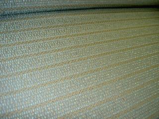 angle view of Exquisite Upscale Contemporary Workroom Fabric Remnant Gold and Aquamarine Metallic Highlights