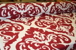 Angle View of this Discounted Home Decor fabric at Schindler's Upholstery Shop Prestigious Textiles Pattern Dramatic Color Ruby Interior Decorating Fabric