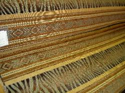 Angle view of stripe up the roll furniture upholstery fabric by Swavelle at Schindlers